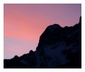 Spedisci la cartolina "Il profilo dei monti al tramonto"